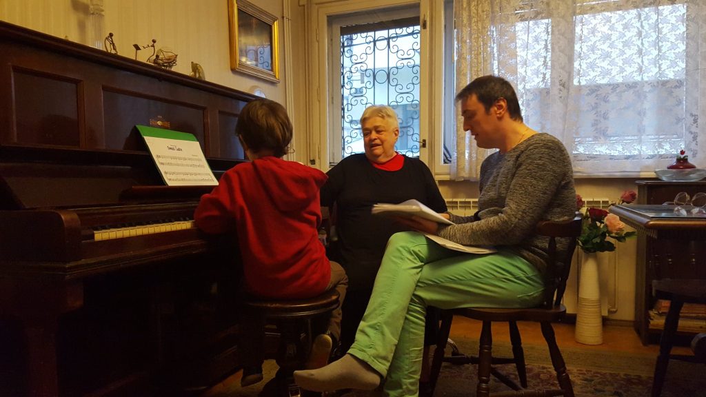 Cu fiul și cu fosta profesoară de pian