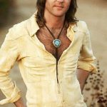 September 1973, Topanga Canyon, Los Angeles, California, USA --- The Eagles' guitarist, Randy Meisner, stands in Topanga Canyon.  The Eagles were the most popular band of the seventies and their reunion tour in the nineties was also very successful. --- Image by © Henry Diltz/CORBIS