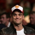 Singer Robbie Williams sits ringside for the Ricky Hatton Jose Luis Castillo fight for the IBO jr. welterweight championship boxing match at the Thomas and Mack Center in Las Vegas, Saturday, June 23, 2007.,Image: 600969628, License: Rights-managed, Restrictions: This content is intended for editorial use only. For other uses, additional clearances may be required., Model Release: no, Pictured: Robbie Williams, Credit line: Eric Jamison / AP / Profimedia