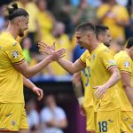 MUNICH, GERMANY - JUNE 17: Razvan Marin of Romania celebrates with teammate Radu Dragusin after scoring his team's second goal during the UEFA EURO 2024 group stage match between Romania and Ukraine at Munich Football Arena on June 17, 2024 in Munich, Germany. (Photo by Clive Mason/Getty Images)