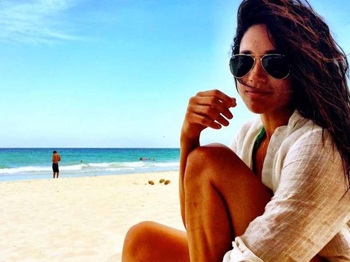 Imagini rare cu Meghan Markle în costum de baie 34